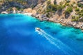 Speed boat in blue sea at sunrise in summer. Aerial view Royalty Free Stock Photo