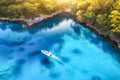 Speed boat in blue sea at sunrise in summer. Aerial view Royalty Free Stock Photo