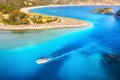 Speed boat in blue sea at sunrise in summer. Aerial view Royalty Free Stock Photo