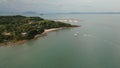 Speed boat floating at the bay shore with marina bay background aerial view