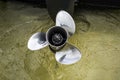 Speed boat propeller out of water