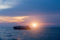 speed boat on the sea with sunset sky background Royalty Free Stock Photo