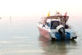 Speed boat on a sunset background