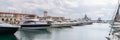 Speed boats at harbor. Power boats moored in marina. Sea coast pier Royalty Free Stock Photo