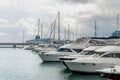 Speed boats at harbor. Power boats moored in marina. Sea coast pier Royalty Free Stock Photo