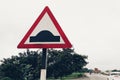 Speed breaker sign on the road side, speed bump sign Royalty Free Stock Photo