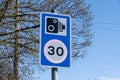 Speed camera warning sign with 30mph speed limit Moreton Wirral May 2021 Royalty Free Stock Photo