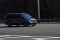 Luxury car silver Mercedes Benz Viano speeding on empty highway