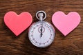 Speed Dating Concept. Hearts And A Stop Watch