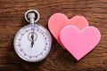 Speed Dating Concept. Hearts And A Stop Watch Royalty Free Stock Photo