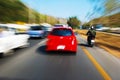 Speed drive following red car Royalty Free Stock Photo