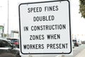 speed fines doubled in construction zones when workers present square exterior. p