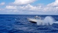 Speed fishing tender boat jumping the waves in the sea and cruising the blue ocean day in Bahamas. Blue beautiful water Royalty Free Stock Photo