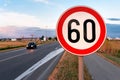 Speed limit at 60 kmph traffic sign by the road