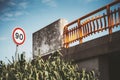 Speed limit road sign near a bridge Royalty Free Stock Photo