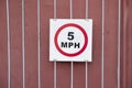 Speed limit sign slow down to 5 mph Royalty Free Stock Photo