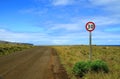Speed limit signpost on the roadside of Easter Island Royalty Free Stock Photo