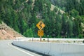 Speed limit traffic sign,35 MPH and winding road. Royalty Free Stock Photo