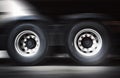 Speed Motion Blur of Semi Truck Wheels Spininng. Truck Driving on The Road. Industry Freight Truck Transport. Royalty Free Stock Photo