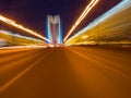 Speed motion on the neon glowing road at dark. Royalty Free Stock Photo