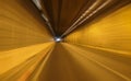 Speed motion on the road in tunnel Orange and motion streaks,blur and movement,copy space Royalty Free Stock Photo