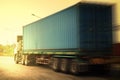 Speed Motion of Semi Trailer Truck Driving on The Road. Shipping Container Truck Transport. Freight Trucks Logistics Royalty Free Stock Photo