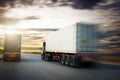 Speed Motion of Semi Trailer Truck Driving on The Road with The Sunset. Freight Trucks Logistics Cargo Transport. Royalty Free Stock Photo