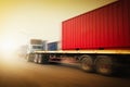 Speed Motion of Semi Trailer Truck Driving on The Road with The Sunset. Freight Trucks Logistics Cargo Transport. Royalty Free Stock Photo