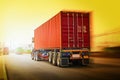 Semi Trailer Trucks Driving on Highway Road. Shipping Container Trucks. Freight Trucks Logistics, Cargo Transport. Royalty Free Stock Photo