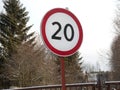 Speed restriction road sign