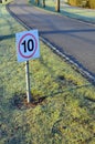 Speed restriction road traffic sign.