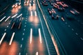 light trails on motorway highway at night, long exposure abstract urban background Royalty Free Stock Photo