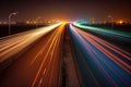 Speed Traffic - light trails on motorway highway at night, long exposure abstract urban background.Generative AI Royalty Free Stock Photo