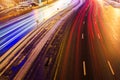 Speed Traffic light trails on motorway highway at night, long exposure abstract urban background. Royalty Free Stock Photo