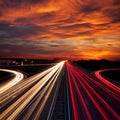 Speed Traffic at Sundown Time - light trails on motorway highway Royalty Free Stock Photo