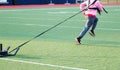 Speed training pulling a weighted sled Royalty Free Stock Photo