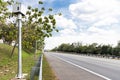 Speed trap surveillance camera along highway to control speeding Royalty Free Stock Photo