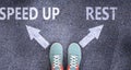 Speed up and rest as different choices in life - pictured as words Speed up, rest on a road to symbolize making decision and