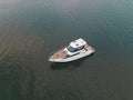 Speedboat on dark water aerial view. Boat trip at sea. drone view. Royalty Free Stock Photo