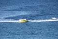 Speedboat people tubing on the blue sea Royalty Free Stock Photo