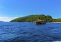 Speedboat sails in sea near the island