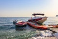 Speedboat and water tubes waiting tourists on beach of the Mediterranean sea in Turkey