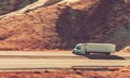 Speeding American Semi Truck on the Utahs Interstate High 70 Royalty Free Stock Photo