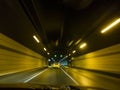 Speeding Cars Inside A Highway Urban Tunnel Motion Blur Background. Royalty Free Stock Photo