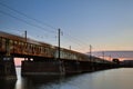 Speeding Freight Train On Rusty Bridge Royalty Free Stock Photo