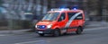 A speeding german ambulance Royalty Free Stock Photo