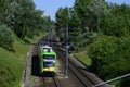 Green tram in sunny day