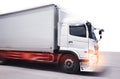 Speeding Motion of Cargo Trucks Driving on The Road. Delivery Truck. Shipping Freight Truck. Logistics Cargo Transport. Royalty Free Stock Photo