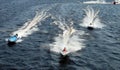 Speeding motorboats