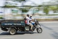 Speeding scooter truck Vietnam